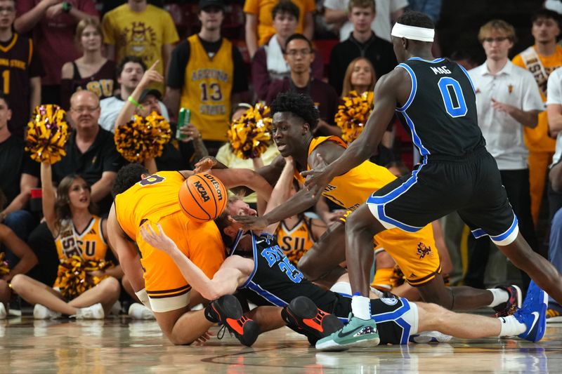 Feb 26, 2025; Tempe, Arizona, USA; Arizona State Sun Devils forward Basheer Jihad (8) and Brigham Young Cougars guard Dawson Baker (25) and Arizona State Sun Devils guard Joson Sanon (3) and Brigham Young Cougars forward Mawot Mag (0) go after a loose ball during the second half at Desert Financial Arena. Mandatory Credit: Joe Camporeale-Imagn Images