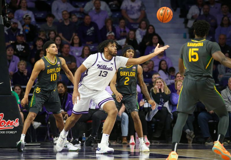 Jan 16, 2024; Manhattan, Kansas, USA; Kansas State Wildcats center Will McNair Jr. (13) goes after a loose ball against Baylor Bears guard Jayden Nunn (2) and guard RayJ Dennis (10) during the second half at Bramlage Coliseum. Mandatory Credit: Scott Sewell-USA TODAY Sports