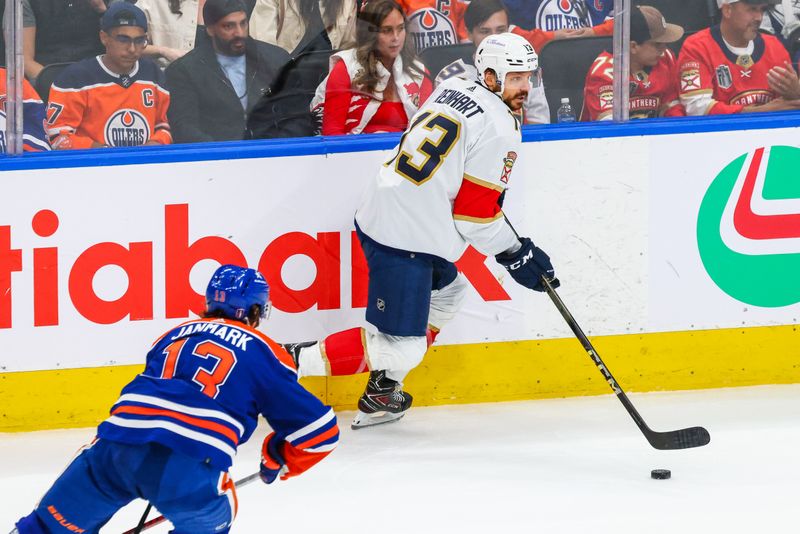 Jun 15, 2024; Edmonton, Alberta, CAN; Florida Panthers center Sam Reinhart (13) controls the puck against the Edmonton Oilers during the third period in game four of the 2024 Stanley Cup Final at Rogers Place. Mandatory Credit: Sergei Belski-USA TODAY Sports