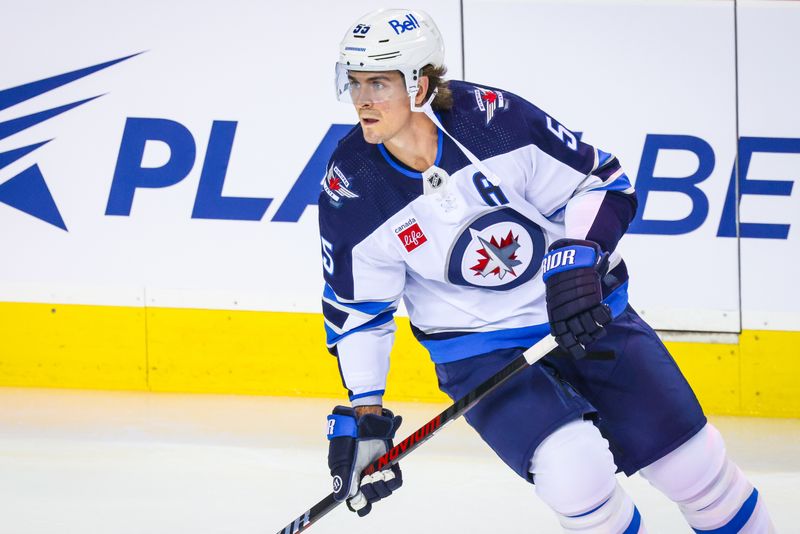 Oct 11, 2023; Calgary, Alberta, CAN; Winnipeg Jets center Mark Scheifele (55) skates during the warmup period against the Calgary Flames at Scotiabank Saddledome. Mandatory Credit: Sergei Belski-USA TODAY Sports