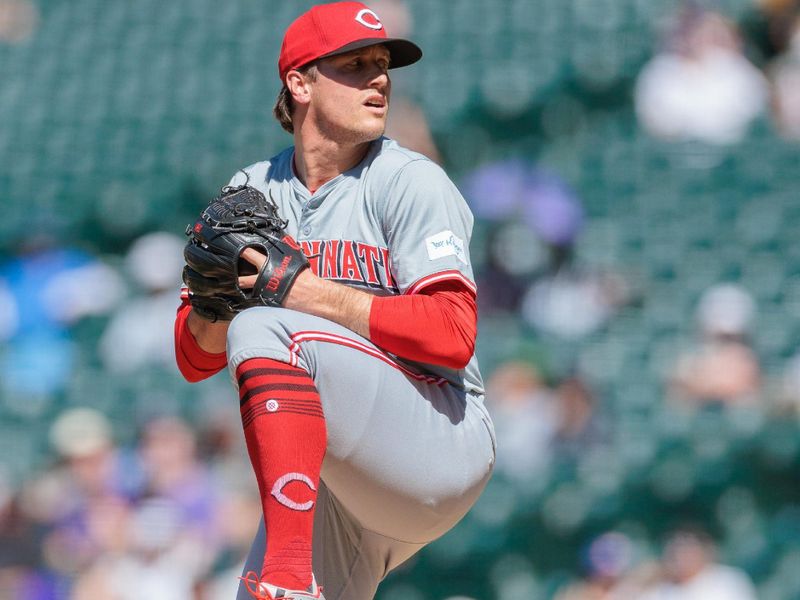 Jun 5, 2024; Denver, Colorado, USA; Cincinnati Reds relief pitcher Lucas Sims (39) delivers a pitch during the seventh inning against the Colorado Rockies at Coors Field. Mandatory Credit: Andrew Wevers-USA TODAY Sports