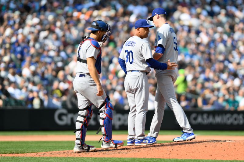 Sep 17, 2023; Seattle, Washington, USA; Los Angeles Dodgers manager Dave Roberts (30) pulls relief pitcher Ryan Yarbrough (56) from the game during the sixth inning against the Seattle Mariners at T-Mobile Park. Mandatory Credit: Steven Bisig-USA TODAY Sports