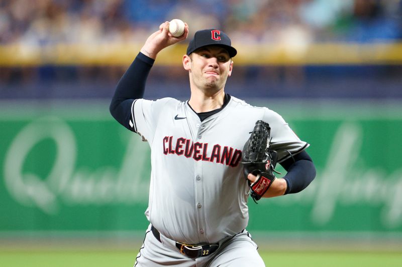 Jul 13, 2024; St. Petersburg, Florida, USA; Cleveland Guardians pitcher Gavin Williams (32) throws a pitch against the Tampa Bay Rays in the second inning at Tropicana Field. Mandatory Credit: Nathan Ray Seebeck-USA TODAY Sports