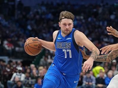 DALLAS, TX - DECEMBER 14: Luka Doncic #77 of the Dallas Mavericks dribbles the ball during the game against the Minnesota Timberwolves on December 14, 2023 at the American Airlines Center in Dallas, Texas. NOTE TO USER: User expressly acknowledges and agrees that, by downloading and or using this photograph, User is consenting to the terms and conditions of the Getty Images License Agreement. Mandatory Copyright Notice: Copyright 2023 NBAE (Photo by Glenn James/NBAE via Getty Images)