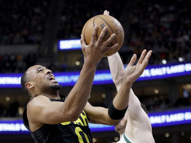 SALT LAKE CITY, UT - MARCH 24: Talen Horton-Tucker #0 of the Utah Jazz goes to the basket against the Milwaukee Bucks on March 24, 2023 at vivint.SmartHome Arena in Salt Lake City, Utah. NOTE TO USER: User expressly acknowledges and agrees that, by downloading and or using this Photograph, User is consenting to the terms and conditions of the Getty Images License Agreement. Mandatory Copyright Notice: Copyright 2023 NBAE (Photo by Jeff Swinger/NBAE via Getty Images)