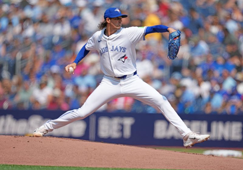 Jul 27, 2024; Toronto, Ontario, CAN; Toronto Blue Jays starting pitcher Kevin Gausman (34) throws a pitch against the Texas Rangers during the first inning at Rogers Centre. Mandatory Credit: Nick Turchiaro-USA TODAY Sports