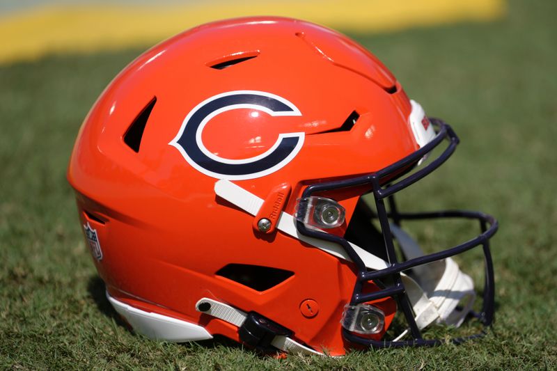 An alternate color Chicago Bears helmet rests on the sidelines before an NFL preseason football game against the Tampa Bay Buccaneers, Sunday, Sept. 17, 2023, in Tampa, Fla. (AP Photo/Peter Joneleit)