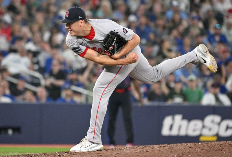 Jun 17, 2024; Toronto, Ontario, CAN;  Boston Red Sox relief pitcher Brad Keller (46) delivers a pitch against the Toronto Blue Jays in the ninth inning at Rogers Centre. Mandatory Credit: Dan Hamilton-USA TODAY Sports