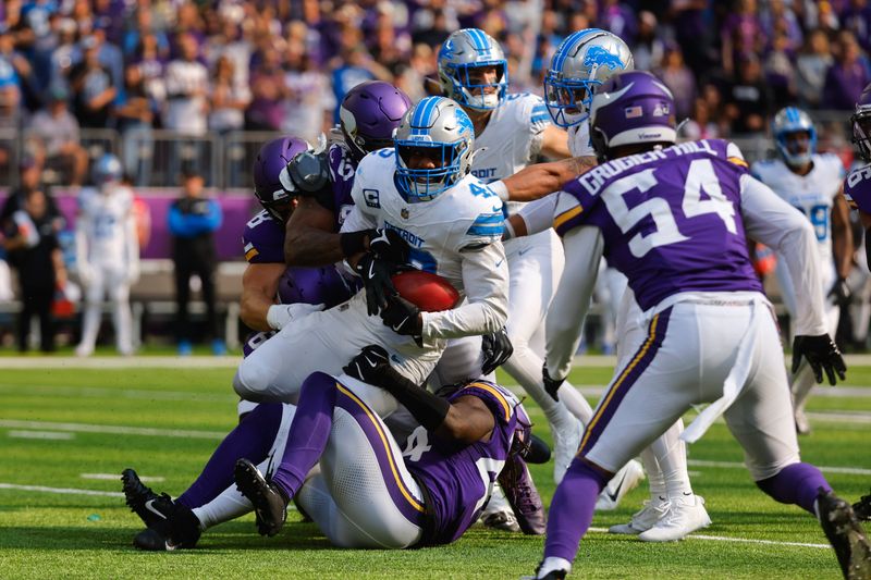 Detroit Lions linebacker Jalen Reeves-Maybin (42) is stopped by the Minnesota Vikings on a failed fake punt on fourth down during the first half of an NFL football game Sunday, Oct. 20, 2024, in Minneapolis. (AP Photo/Bruce Kluckhohn)