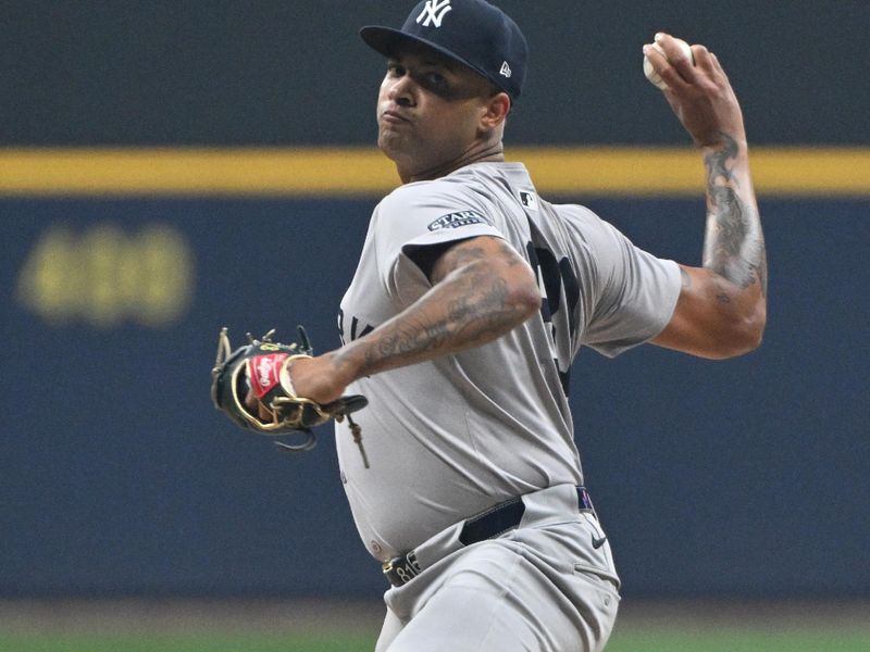 Apr 26, 2024; Milwaukee, Wisconsin, USA; New York Yankees pitcher Luis Gil (81) delivers a pitch against the Milwaukee Brewers in the first inning at American Family Field. Mandatory Credit: Michael McLoone-USA TODAY Sports