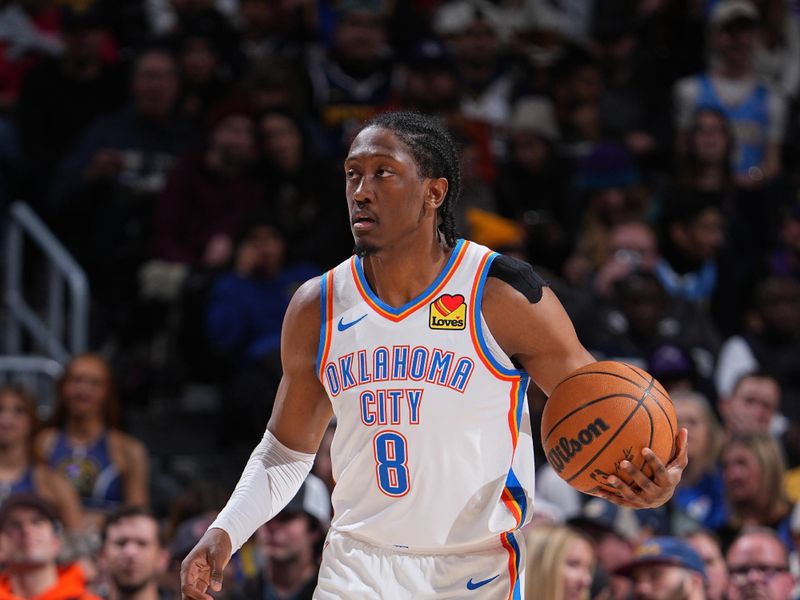 DENVER, CO - NOVEMBER 6: Jalen Williams #8 of the Oklahoma City Thunder dribbles the ball during the game against the Denver Nuggets on November 6, 2024 at Ball Arena in Denver, Colorado. NOTE TO USER: User expressly acknowledges and agrees that, by downloading and/or using this Photograph, user is consenting to the terms and conditions of the Getty Images License Agreement. Mandatory Copyright Notice: Copyright 2024 NBAE (Photo by Garrett Ellwood/NBAE via Getty Images)