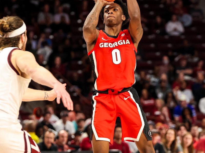 Mar 4, 2023; Columbia, South Carolina, USA; Georgia Bulldogs guard Terry Roberts (0) shoots over South Carolina Gamecocks forward Hayden Brown (10) in the second half at Colonial Life Arena. Mandatory Credit: Jeff Blake-USA TODAY Sports