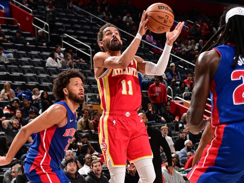 DETROIT, MI - NOVEMBER 8: Trae Young #11 of the Atlanta Hawks shoots the ball during the game against the Detroit Pistons on November  8, 2024 at Little Caesars Arena in Detroit, Michigan. NOTE TO USER: User expressly acknowledges and agrees that, by downloading and/or using this photograph, User is consenting to the terms and conditions of the Getty Images License Agreement. Mandatory Copyright Notice: Copyright 2024 NBAE (Photo by Chris Schwegler/NBAE via Getty Images)