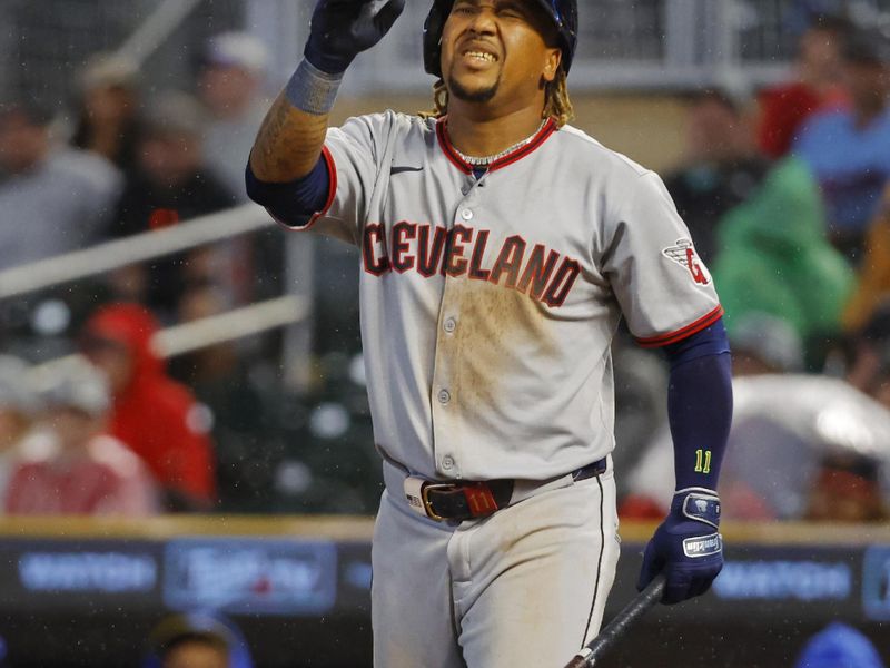 Sep 19, 2025; Minneapolis, Minnesota, USA; Cleveland Guardians third baseman Jose Ramirez (11) reacts after being hit by a pitch against the Minnesota Twins in the ninth inning at Target Field. Mandatory Credit: Bruce Kluckhohn-Imagn Images