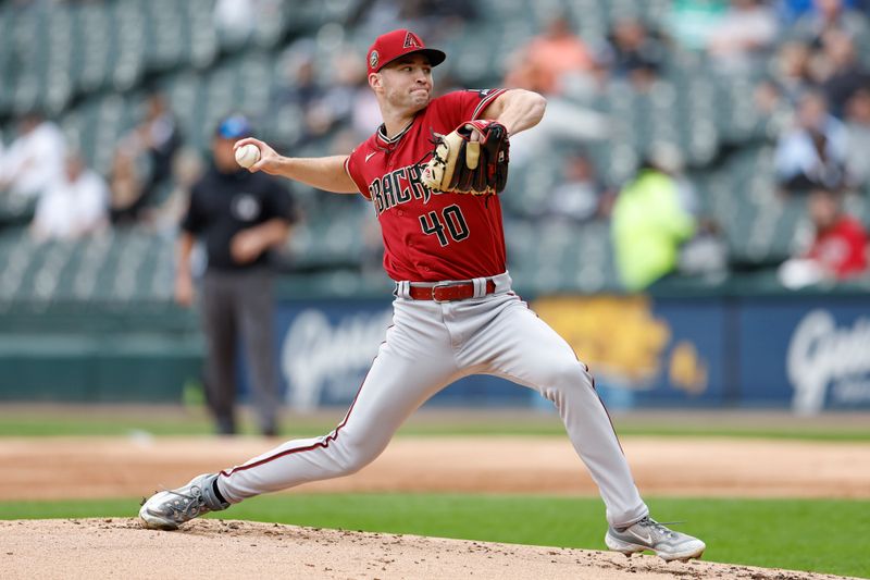 Sep 28, 2023; Chicago, Illinois, USA; Arizona Diamondbacks relief pitcher Bryce Jarvis (40) delivers a pitch against the Chicago White Sox during the first inning at Guaranteed Rate Field. Mandatory Credit: Kamil Krzaczynski-USA TODAY Sports