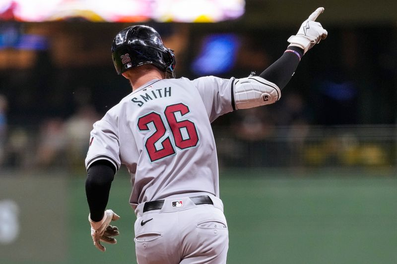 Sep 19, 2024; Milwaukee, Wisconsin, USA;  Arizona Diamondbacks left fielder Pavin Smith (26) celebrates after hitting a home run during the eighth inning against the Milwaukee Brewers at American Family Field. Mandatory Credit: Jeff Hanisch-Imagn Images