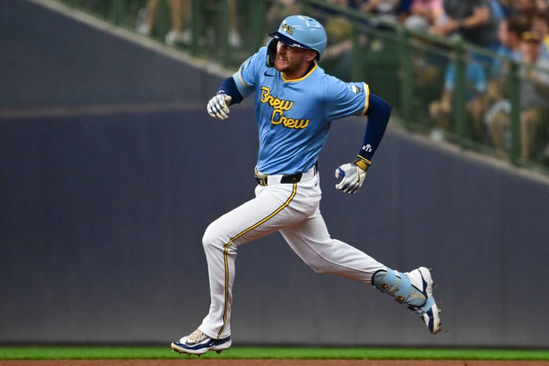 Aug 18, 2024; Milwaukee, Wisconsin, USA; Milwaukee Brewers second baseman Brice Turang (2) runs the bases after hitting a triple in the first inning against the Cleveland Guardians at American Family Field. Mandatory Credit: Benny Sieu-USA TODAY Sports