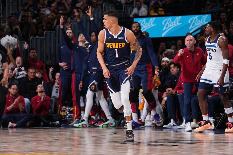 DENVER, CO - APRIL 10: Michael Porter Jr. #1 of the Denver Nuggets celebrates a three point basket during the game against the Minnesota Timberwolves on April 10, 2024 at the Ball Arena in Denver, Colorado. NOTE TO USER: User expressly acknowledges and agrees that, by downloading and/or using this Photograph, user is consenting to the terms and conditions of the Getty Images License Agreement. Mandatory Copyright Notice: Copyright 2024 NBAE (Photo by Bart Young/NBAE via Getty Images)