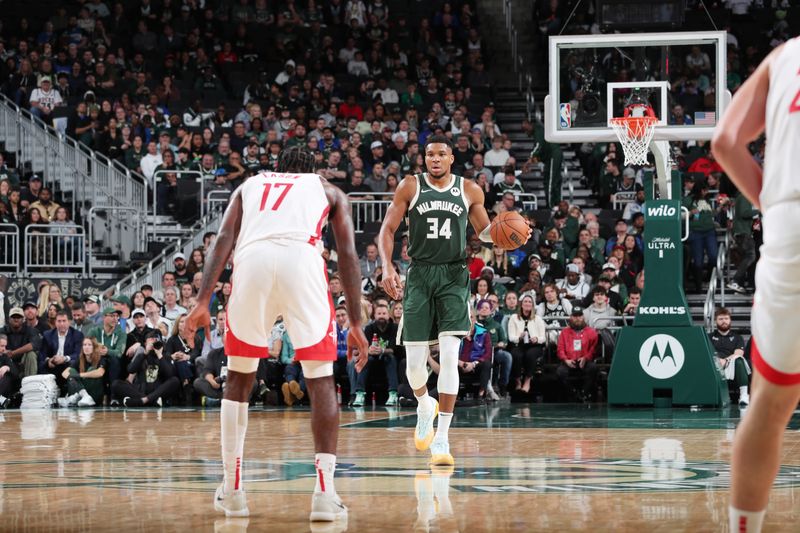 MILWAUKEE, WI - NOVEMBER 18: Giannis Antetokounmpo #34 of the Milwaukee Bucks dribbles the ball during the game against the Houston Rockets on November 18, 2024 at the Fiserv Forum Center in Milwaukee, Wisconsin. NOTE TO USER: User expressly acknowledges and agrees that, by downloading and or using this Photograph, user is consenting to the terms and conditions of the Getty Images License Agreement. Mandatory Copyright Notice: Copyright 2024 NBAE (Photo by Gary Dineen/NBAE via Getty Images).