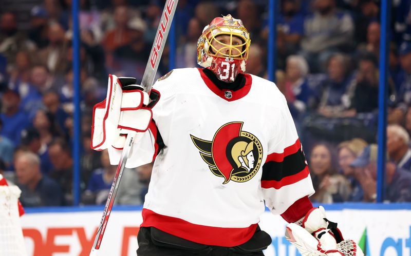 Apr 11, 2024; Tampa, Florida, USA; Ottawa Senators goaltender Anton Forsberg (31) looks on against the Tampa Bay Lightning during the first period at Amalie Arena. Mandatory Credit: Kim Klement Neitzel-USA TODAY Sports