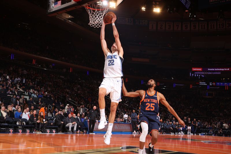 NEW YORK, NY - DECEMBER 3: Franz Wagner #22 of the Orlando Magic drives to the basket during the game against the New York Knicks during the Emirates NBA Cup on December 3, 2024 at Madison Square Garden in New York City, New York.  NOTE TO USER: User expressly acknowledges and agrees that, by downloading and or using this photograph, User is consenting to the terms and conditions of the Getty Images License Agreement. Mandatory Copyright Notice: Copyright 2024 NBAE  (Photo by Nathaniel S. Butler/NBAE via Getty Images)