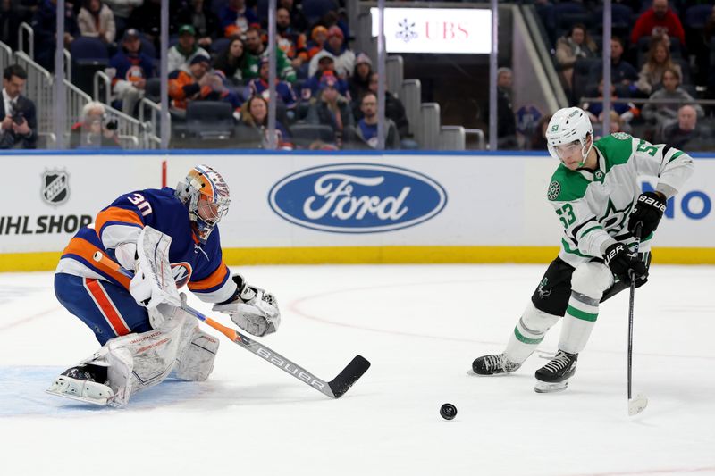 Jan 21, 2024; Elmont, New York, USA; Dallas Stars center Wyatt Johnston (53) takes a shot against New York Islanders goaltender Ilya Sorokin (30) during the third period at UBS Arena. Mandatory Credit: Brad Penner-USA TODAY Sports