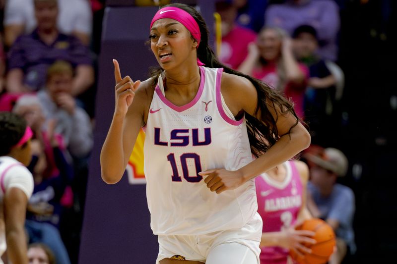 Feb 11, 2024; Baton Rouge, Louisiana, USA; LSU Lady Tigers forward Angel Reese (10) celebrates a score during the second half against the Alabama Crimson Tide at Pete Maravich Assembly Center. Mandatory Credit: Matthew Hinton-USA TODAY Sports