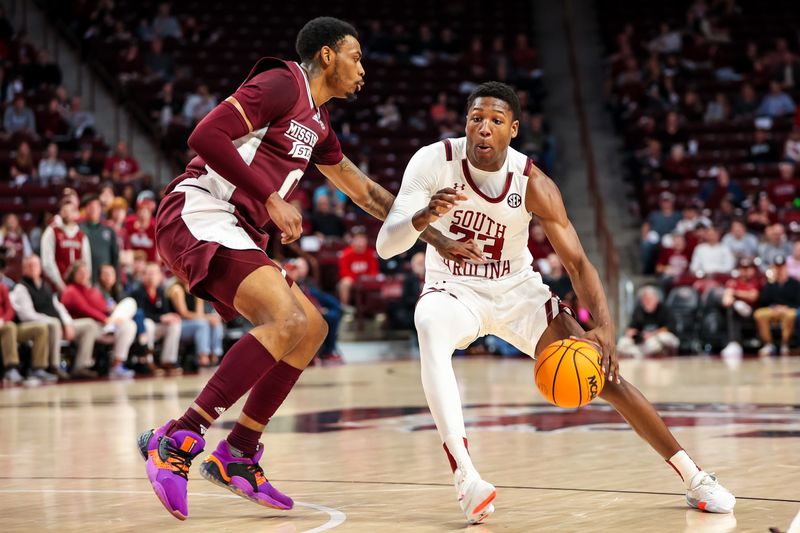 Jan 31, 2023; Columbia, South Carolina, USA; South Carolina Gamecocks forward Gregory Jackson II (23) drives around Mississippi State Bulldogs forward D.J. Jeffries (0) in the first half at Colonial Life Arena. Mandatory Credit: Jeff Blake-USA TODAY Sports