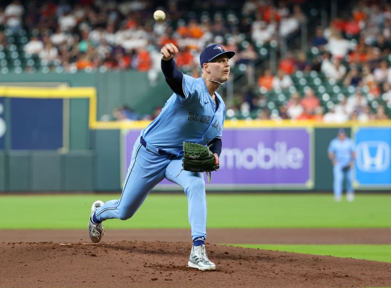 Apr 23, 2025; Houston, Texas, USA;  Toronto Blue Jays starting pitcher Kevin Gausman (34) pitches against the Houston Astros in the second inning at Daikin Park. Mandatory Credit: Thomas Shea-Imagn Images