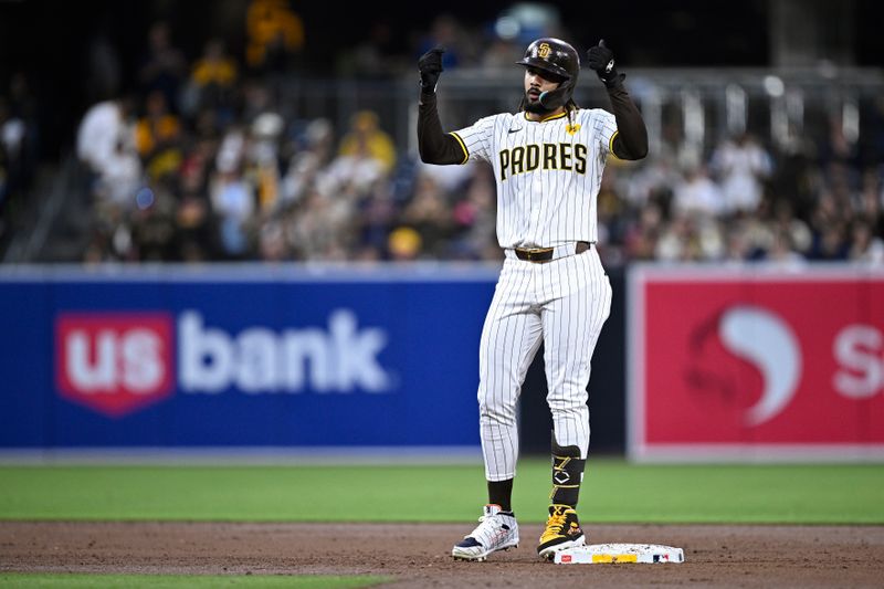 Apr 30, 2024; San Diego, California, USA; San Diego Padres right fielder Fernando Tatis Jr. (23) celebrates after hitting a double against the Cincinnati Reds during the third inning at Petco Park. Mandatory Credit: Orlando Ramirez-USA TODAY Sports