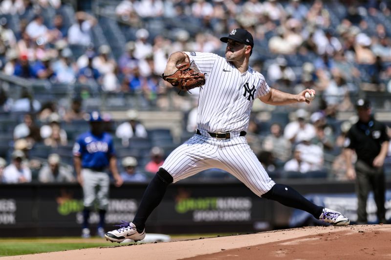 Aug 10, 2024; Bronx, New York, USA; New York Yankees pitcher Carlos Rodón (55) pitches against the Texas Rangers during the first inning at Yankee Stadium. Mandatory Credit: John Jones-USA TODAY Sports