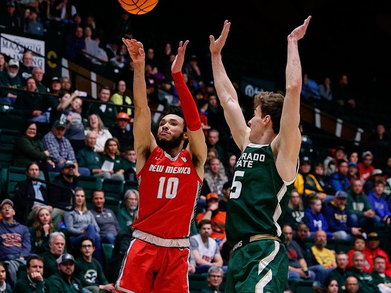 Mar 3, 2023; Fort Collins, Colorado, USA; New Mexico Lobos guard Jaelen House (10) attempts a shot as Colorado State Rams guard Baylor Hebb (5) defends in the first half at Moby Arena. Mandatory Credit: Isaiah J. Downing-USA TODAY Sports