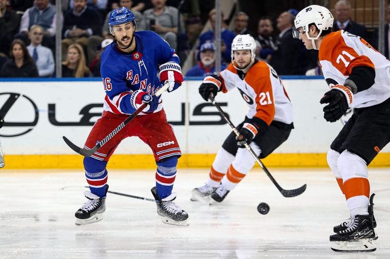 Apr 11, 2024; New York, New York, USA; New York Rangers center Vincent Trocheck (16) passes the puck in front of Philadelphia Flyers right wing Tyson Foerster (71) during the third period at Madison Square Garden. Mandatory Credit: Danny Wild-USA TODAY Sports