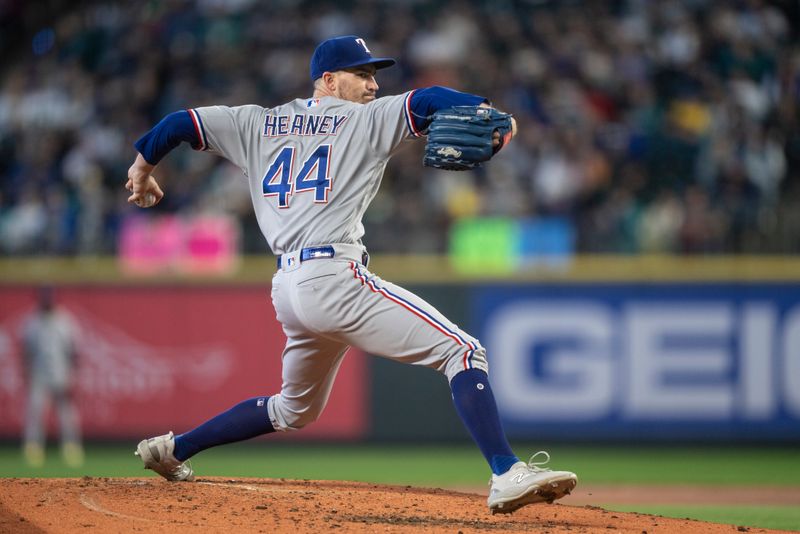 Sep 30, 2023; Seattle, Washington, USA; Texas Rangers starter Andrew Heaney (44) delivers a pitch during the second inning against the Seattle Mariners at T-Mobile Park. Mandatory Credit: Stephen Brashear-USA TODAY Sports