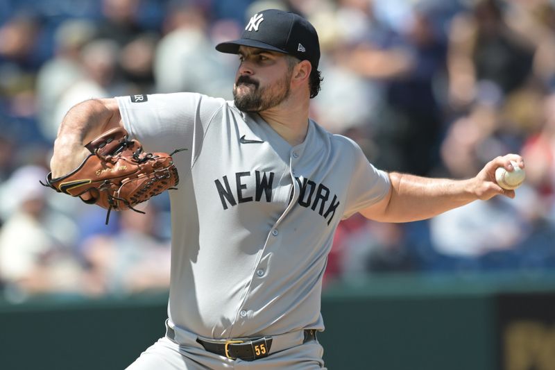 Apr 23, 2025; Cleveland, Ohio, USA; New York Yankees starting pitcher Carlos Rodon (55) throws a pitch during the first inning against the Cleveland Guardians at Progressive Field. Mandatory Credit: Ken Blaze-Imagn Images