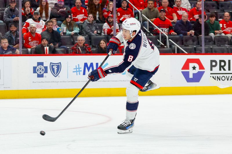 Mar 19, 2024; Detroit, Michigan, USA; Columbus Blue Jackets defenseman Zach Werenski (8) handles the puck during the first period of the game against the Detroit Red Wings at Little Caesars Arena. Mandatory Credit: Brian Bradshaw Sevald-USA TODAY Sports