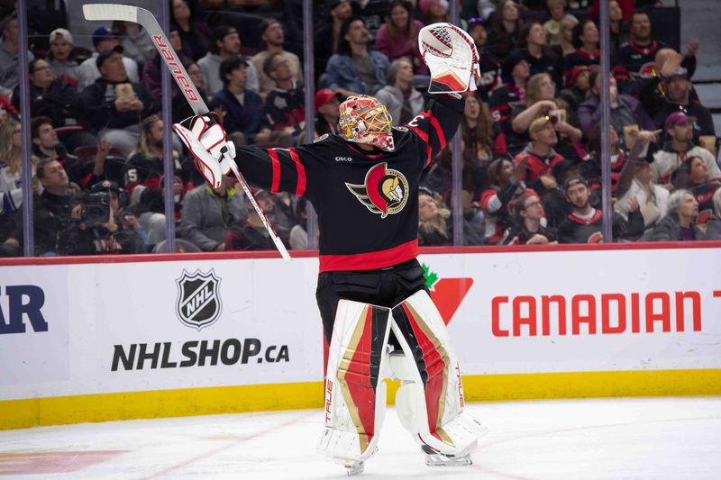 Oct 14, 2024; Ottawa, Ontario, CAN; Ottawa Senators goalie Anton Forsberg (35) reacts after being driven into the net during the second period  against the Los Angeles Kings  at the Canadian Tire Centre. Mandatory Credit: Marc DesRosiers-Imagn Images