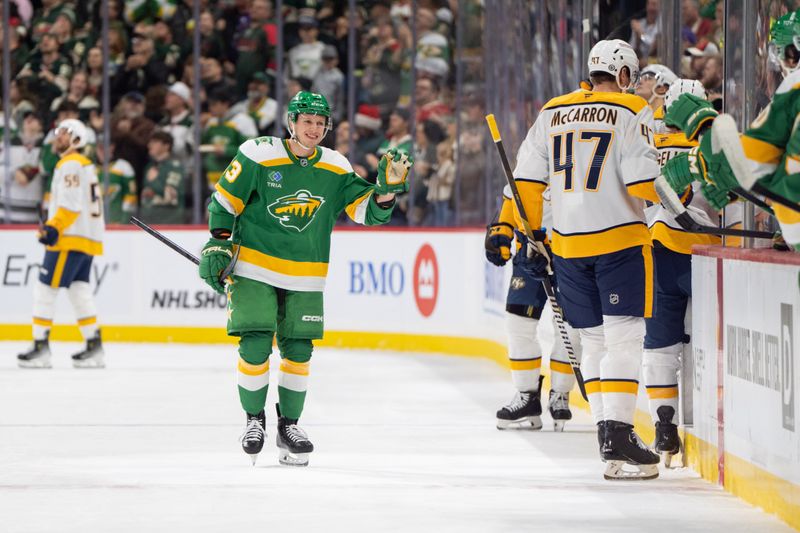 Dec 31, 2024; Saint Paul, Minnesota, USA; Minnesota Wild center Marco Rossi (23) skates to the bench after scoring against the Nashville Predators in the first period at Xcel Energy Center. Mandatory Credit: Matt Blewett-Imagn Images