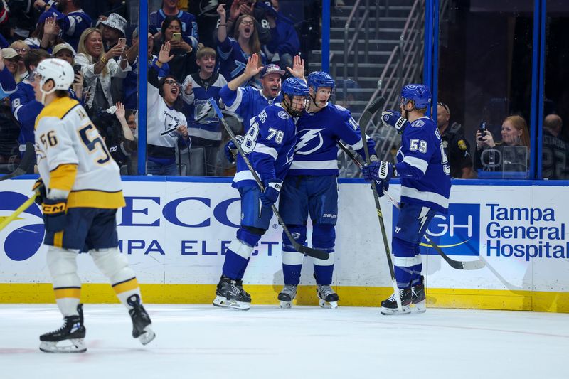 Mar 29, 2026; Tampa, Florida, USA; Tampa Bay Lightning defenseman Emil Lilleberg (78) and center Jake Guentzel (59) react to a goal by right wing Corey Perry (10) (center) against the Nashville Predators in the third period at Benchmark International Arena. Mandatory Credit: Nathan Ray Seebeck-Imagn Images Mar 29, 2026; Tampa, Florida, USA; Tampa Bay Lightning defenseman Emil Lilleberg (78) and center Jake Guentzel (59) react to a goal by right wing Corey Perry (10) (center) against the Nashville Predators in the third period at Benchmark International Arena. Mandatory Credit: Nathan Ray Seebeck-Imagn Images