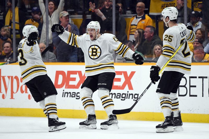 Apr 2, 2024; Nashville, Tennessee, USA; Boston Bruins center Charlie Coyle (13) celebrates with left wing Brad Marchand (63) and defenseman Brandon Carlo (25) after a goal during the third period against the Nashville Predators at Bridgestone Arena. Mandatory Credit: Christopher Hanewinckel-USA TODAY Sports