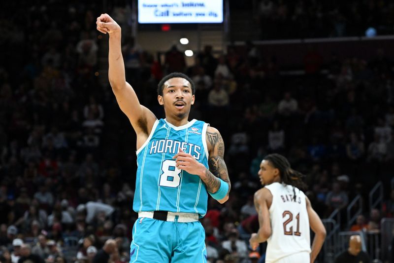 CLEVELAND, OHIO - APRIL 14: Nick Smith Jr. #8 of the Charlotte Hornets celebrates making a three-point basket during the second half against the Cleveland Cavaliers at Rocket Mortgage Fieldhouse on April 14, 2024 in Cleveland, Ohio. NOTE TO USER: User expressly acknowledges and agrees that, by downloading and or using this photograph, User is consenting to the terms and conditions of the Getty Images License Agreement. (Photo by Nick Cammett/Getty Images)