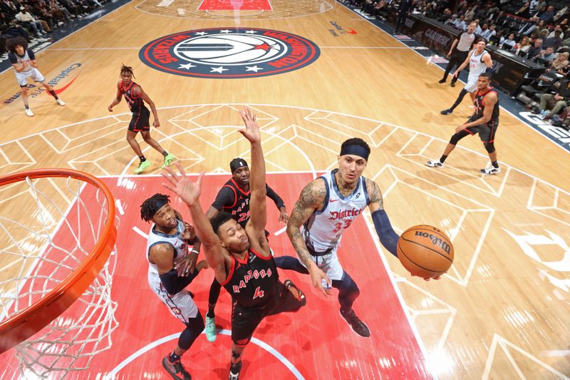 WASHINGTON, DC -?JANUARY 29: Kyle Kuzma #33 of the Washington Wizards drives to the basket during the game against the Toronto Raptors on January 29, 2025 at Capital One Arena in Washington, DC. NOTE TO USER: User expressly acknowledges and agrees that, by downloading and or using this Photograph, user is consenting to the terms and conditions of the Getty Images License Agreement. Mandatory Copyright Notice: Copyright 2025 NBAE (Photo by Stephen Gosling/NBAE via Getty Images)