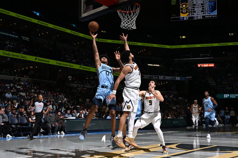 MEMPHIS, TN - NOVEMBER 19: Jaylen Wells #0 of the Memphis Grizzlies drives to the basket during the game against the Denver Nuggets during the Emirates NBA Cup game on November 19, 2024 at FedExForum in Memphis, Tennessee. NOTE TO USER: User expressly acknowledges and agrees that, by downloading and or using this photograph, User is consenting to the terms and conditions of the Getty Images License Agreement. Mandatory Copyright Notice: Copyright 2024 NBAE (Photo by Grant Burke/NBAE via Getty Images)