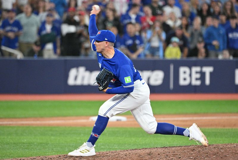Jul 2, 2024; Toronto, Ontario, CAN;   Toronto Blue Jays relief pitcher Chad Green (57) delivers a pitch against the Houston Astros in the ninth inning at Rogers Centre. Mandatory Credit: Dan Hamilton-USA TODAY Sports