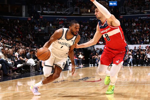 WASHINGTON, DC -? DECEMBER 29:  Mikal Bridges #1 of the Brooklyn Nets handles the ball during the game against the Washington Wizards on December 29, 2023 at Capital One Arena in Washington, DC. NOTE TO USER: User expressly acknowledges and agrees that, by downloading and or using this Photograph, user is consenting to the terms and conditions of the Getty Images License Agreement. Mandatory Copyright Notice: Copyright 2023 NBAE (Photo by Kenny Giarla/NBAE via Getty Images)