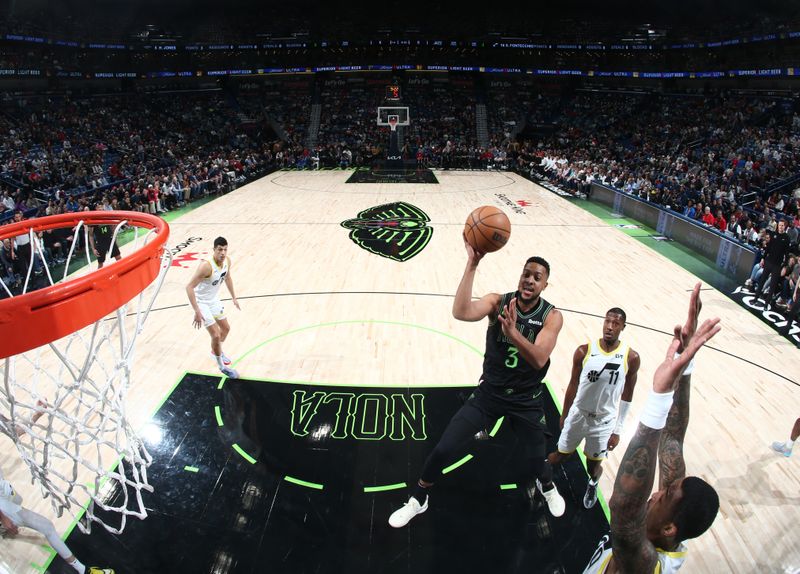 NEW ORLEANS, LA - JANUARY 23: CJ McCollum #3 of the New Orleans Pelicans drives to the basket during the game against the Utah Jazz on January 23, 2024 at the Smoothie King Center in New Orleans, Louisiana. NOTE TO USER: User expressly acknowledges and agrees that, by downloading and or using this Photograph, user is consenting to the terms and conditions of the Getty Images License Agreement. Mandatory Copyright Notice: Copyright 2024 NBAE (Photo by Layne Murdoch Jr./NBAE via Getty Images)