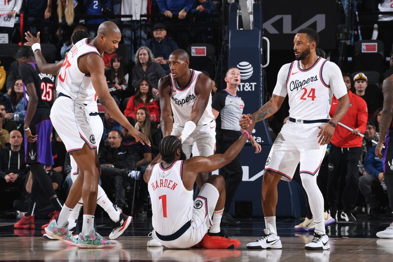 INGLEWOOD, CA - NOVEMBER 9: The LA Clippers help up James Harden #1 of the LA Clippers during the game against the Toronto Raptors on November 9, 2024 at Intuit Dome in Los Angeles, California. NOTE TO USER: User expressly acknowledges and agrees that, by downloading and/or using this Photograph, user is consenting to the terms and conditions of the Getty Images License Agreement. Mandatory Copyright Notice: Copyright 2024 NBAE (Photo by Noah Graham/NBAE via Getty Images)