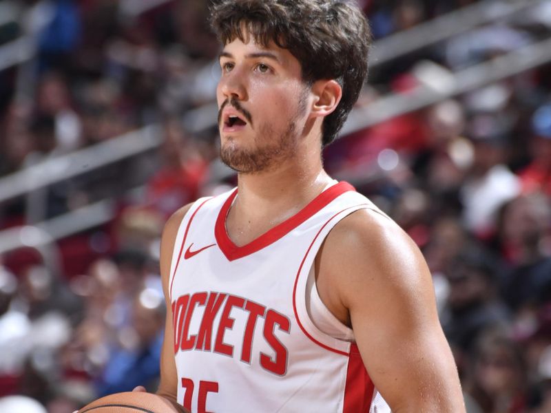 HOUSTON, TX - OCTOBER 15: Reed Sheppard #15 of the Houston Rockets handles the ball during the game against the New Orleans Pelicans during a NBA preseason game on October 15, 2024 at the Toyota Center in Houston, Texas. NOTE TO USER: User expressly acknowledges and agrees that, by downloading and or using this photograph, User is consenting to the terms and conditions of the Getty Images License Agreement. Mandatory Copyright Notice: Copyright 2024 NBAE (Photo by Logan Riely/NBAE via Getty Images)