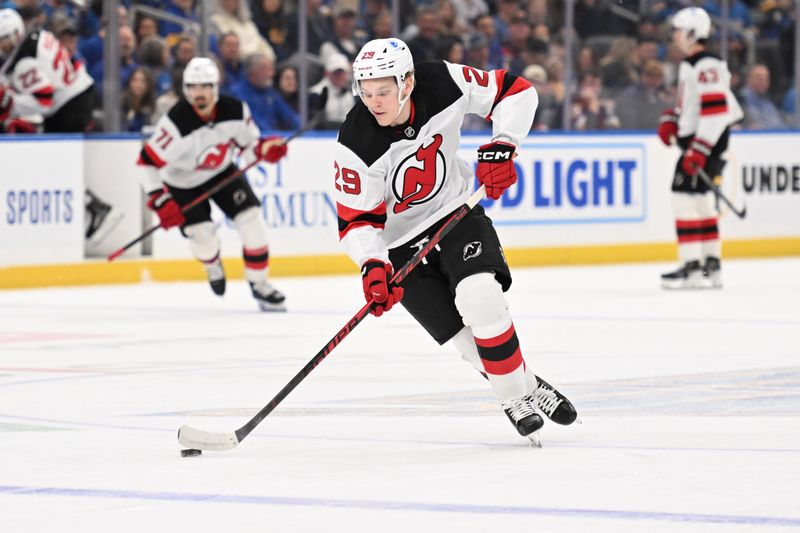 Feb 28, 2026; St. Louis, Missouri, USA; New Jersey Devils right wing Lenni Hameenaho (29) handled the puck against the St. Louis Blues in the first period at Enterprise Center. Mandatory Credit: Joe Puetz-Imagn Images