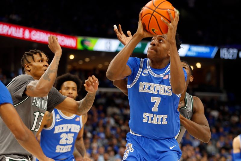 Mar 3, 2024; Memphis, Tennessee, USA; Memphis Tigers forward Nae'Qwan Tomlin (7) shoots during the first half against the UAB Blazers at FedExForum. Mandatory Credit: Petre Thomas-USA TODAY Sports